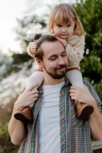 Father spending time with daughter during child custody visitation.